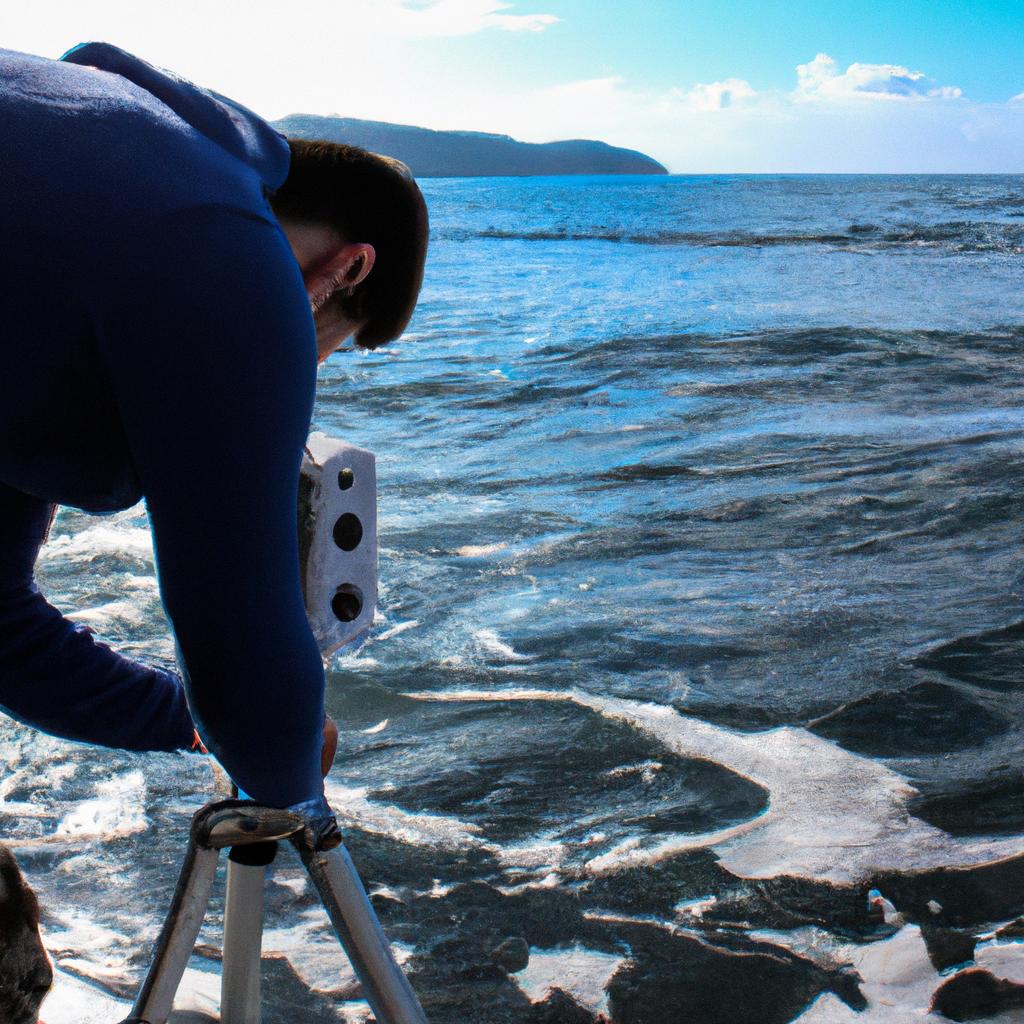 Person studying ocean with equipment